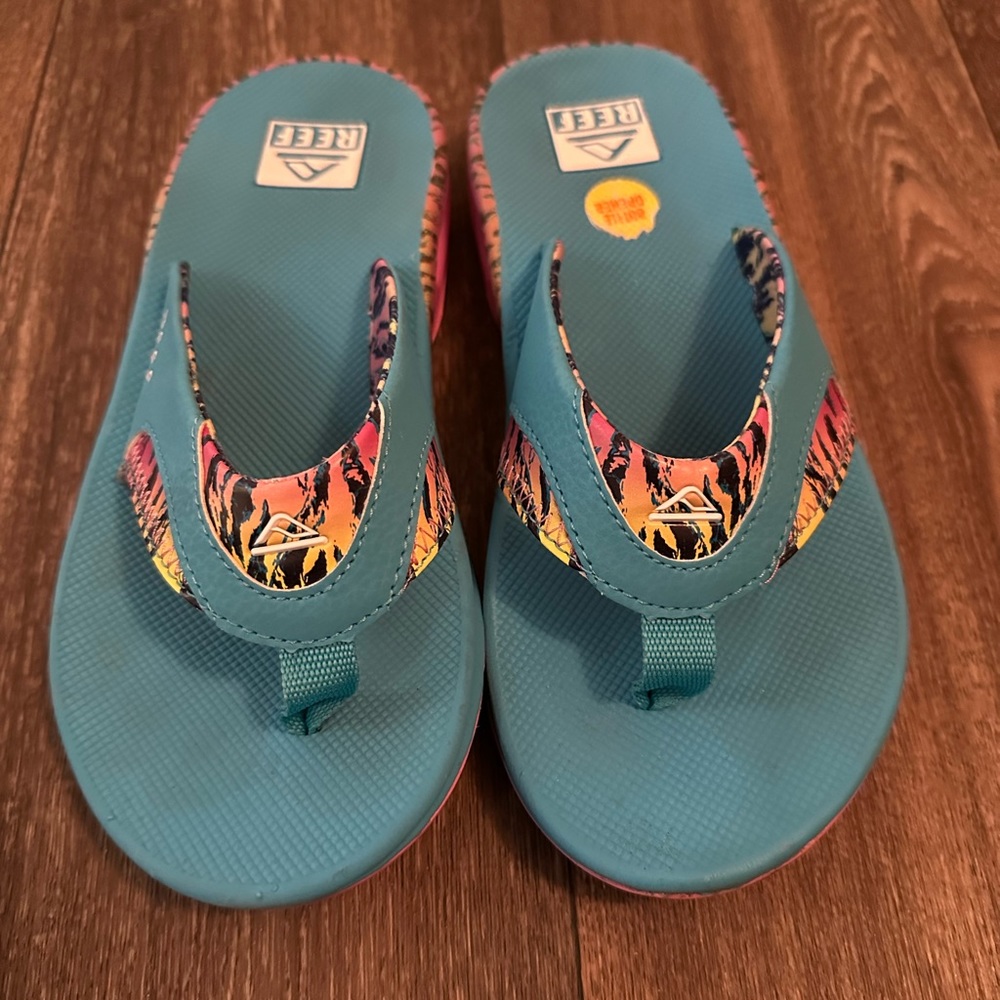 Pink and Blue with colorful tiger print Reef flops. size 8